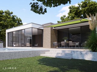 Grüne Kassettenmarkise auf einer Terrasse vom Hersteller Leiner